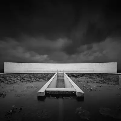 Water Temple by Tadao Ando, [lotus pond exterior / concrete wing walls / descent staircase / vermilion sanctuary interior / light court / Awaji Island hillside context], 1991 Japan
