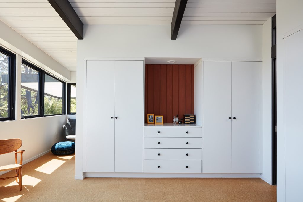 Mid-century modern remodel of Roger Lee 1962 Stanford house by Klopf Architecture,
[exterior redwood facade / corner office hill views / outdoor living room pergola /
living room glass sliders / lower level family room patio / kitchen outdoor dining /
Malm fireplace Heath tiles / primary bedroom window glazing], Stanford California 2020