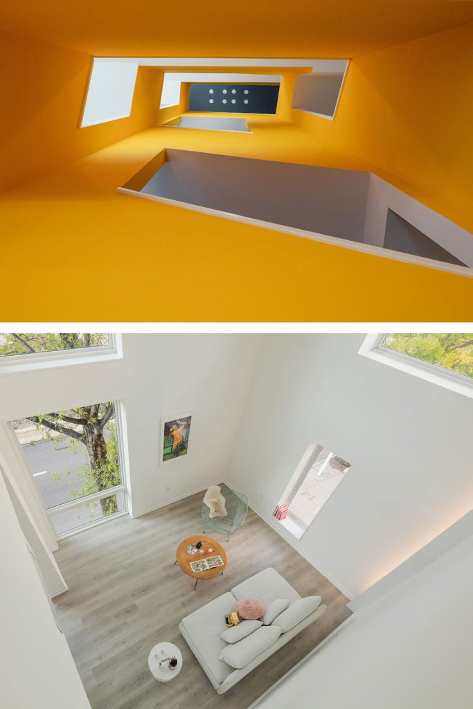 XS House Philadelphia by ISA Interface Studio Architects, [exterior black fiber cement facade / mezzanine interior / narrow site plan / street-level unit entry / bi-level duplex stair / facade projection bay detail / Vine Street Expressway context / building section diagram], 2019